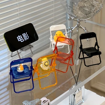 Roztomilé malé stoličky, kreatívne skladacie ploche, mobilný telefón, stojan, lenivý človek naháňa dráma artefakt držiteľ